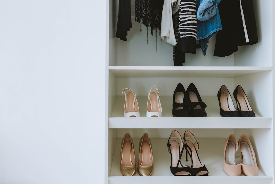 Organized shoe shelves in a custom closet