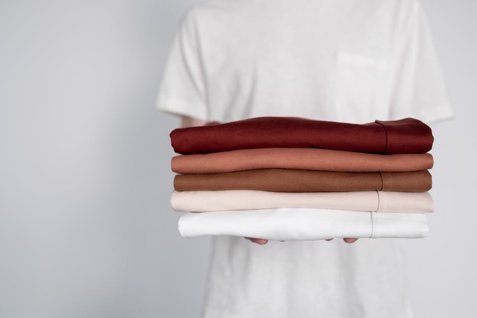 Neatly folded clothes in a custom reach-in closet